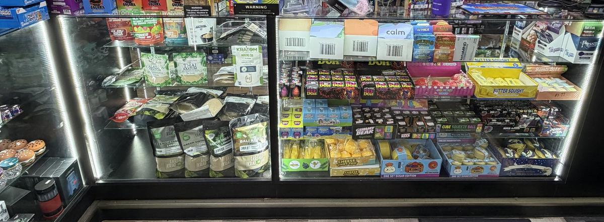 Kratom products on the shelf at One and Done Stop Shop, smoke shop in Canton, OH